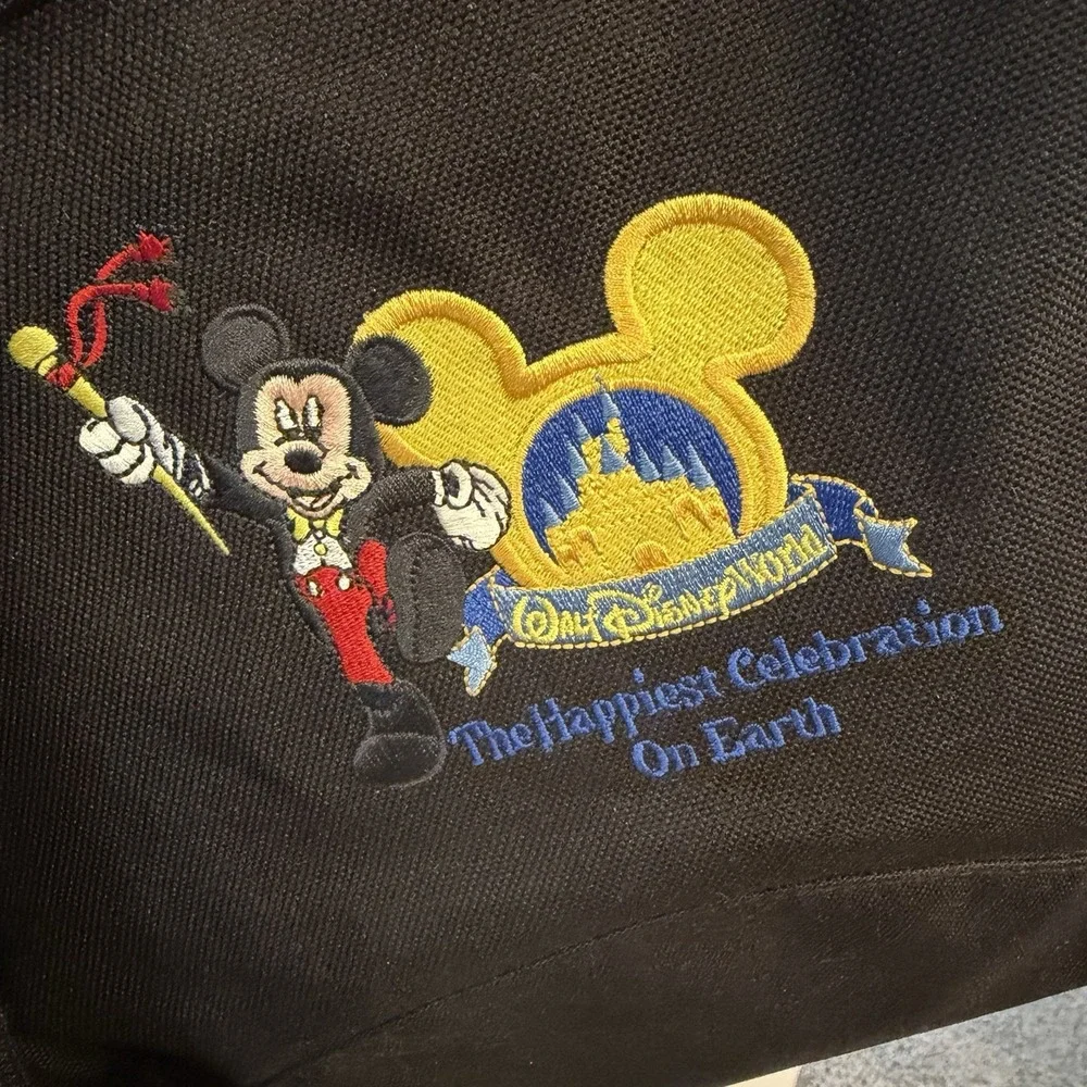 DISNEY WORLD Sling Backpack 2005 Embroidered MICKEY HAPPIEST CELEBRATION Ear Zip